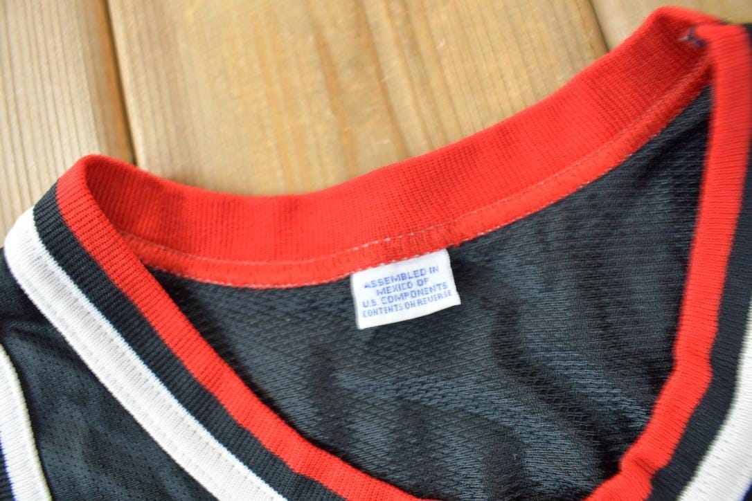 Vintage 1990s Michael Jordan Chicago Bulls NBA Champion Jersey Youth M - Image 4